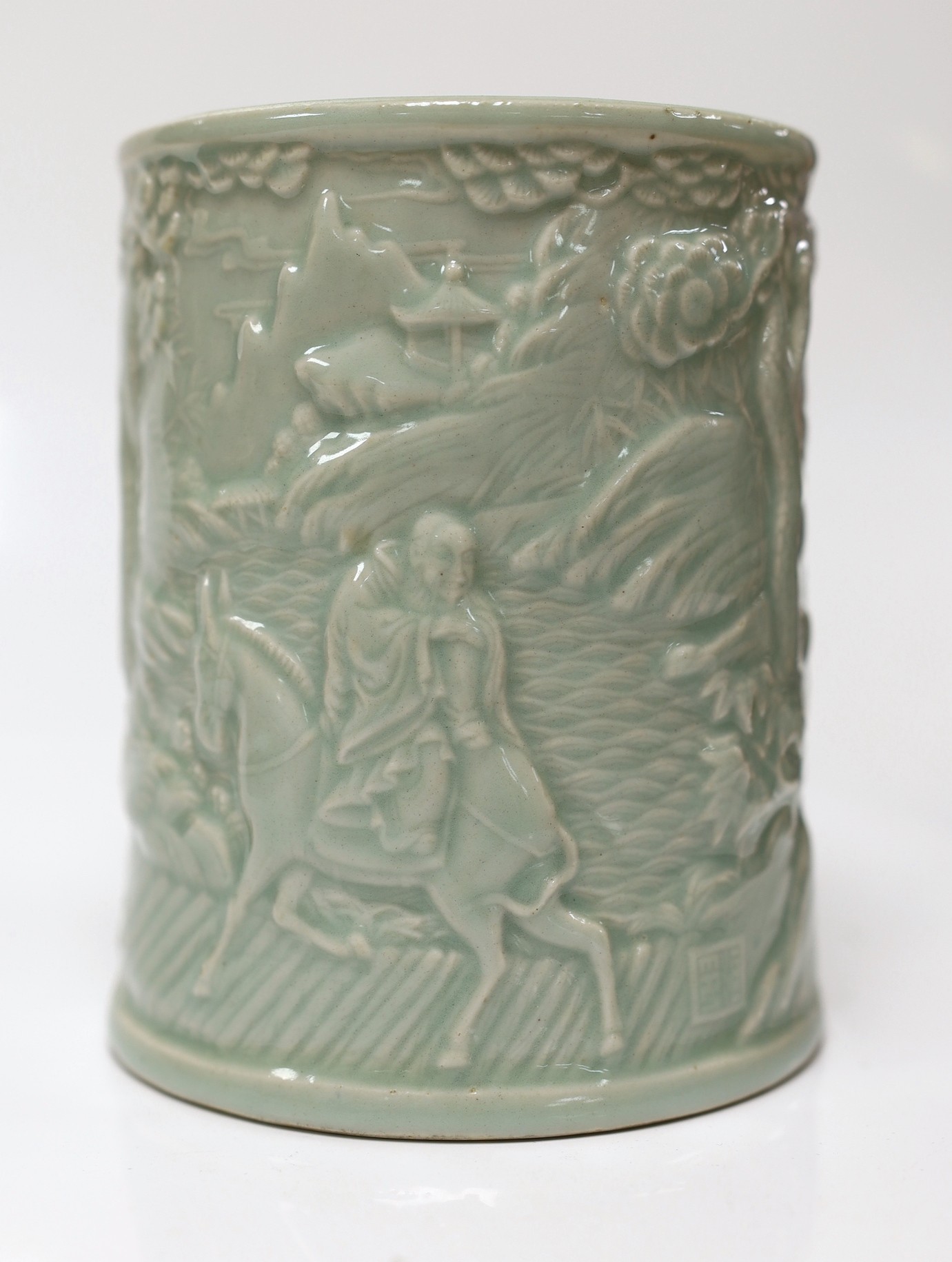 A Chinese celadon glazed brush pot, 15cm